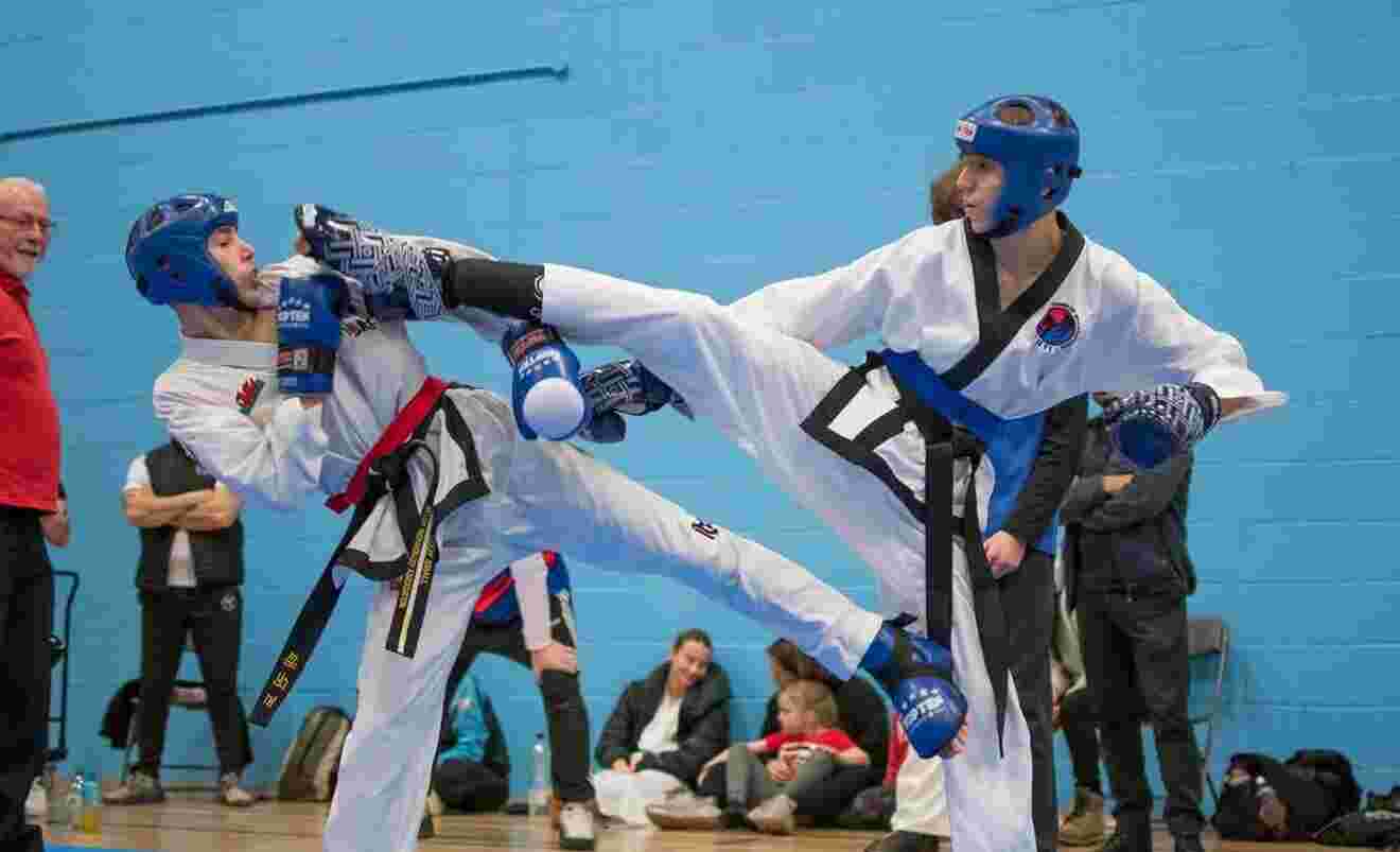 Swindon Taekwondo member kicking the competition