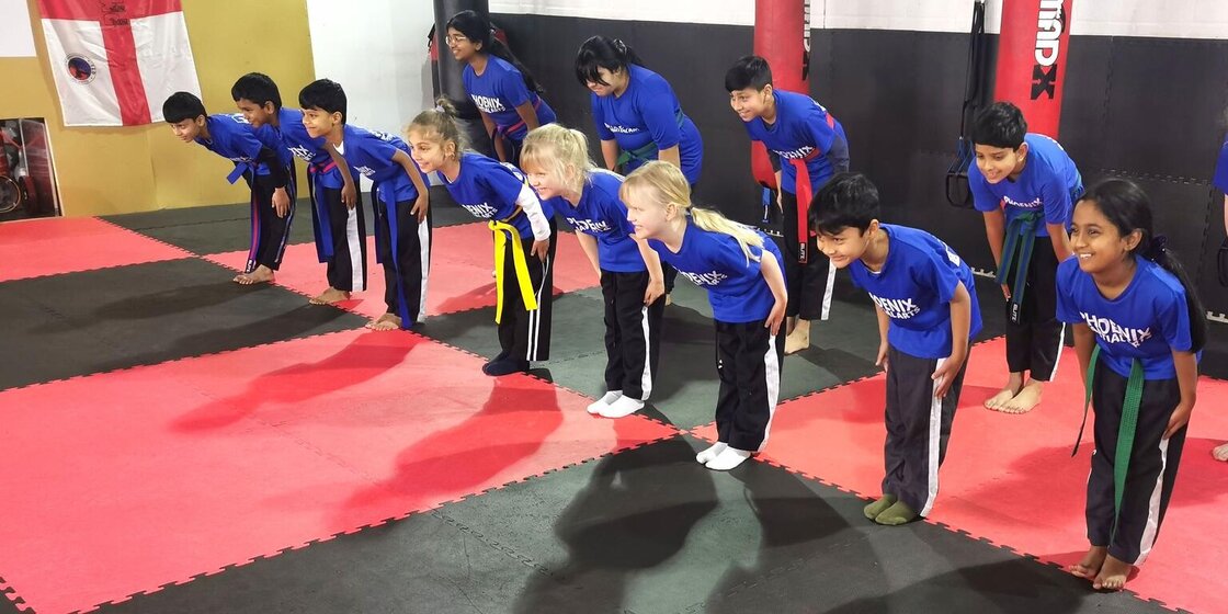 Martial Arts Children Lined Up Bowing Respect