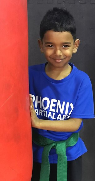 Child Holding Punchbag at Swindon Martial Arts Club